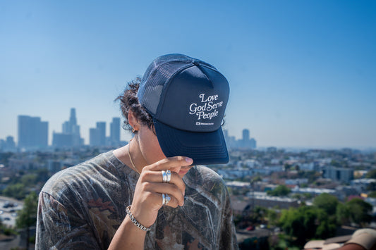 Love God Serve People Trucker Hat