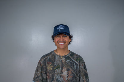 Love God Serve People Trucker Hat